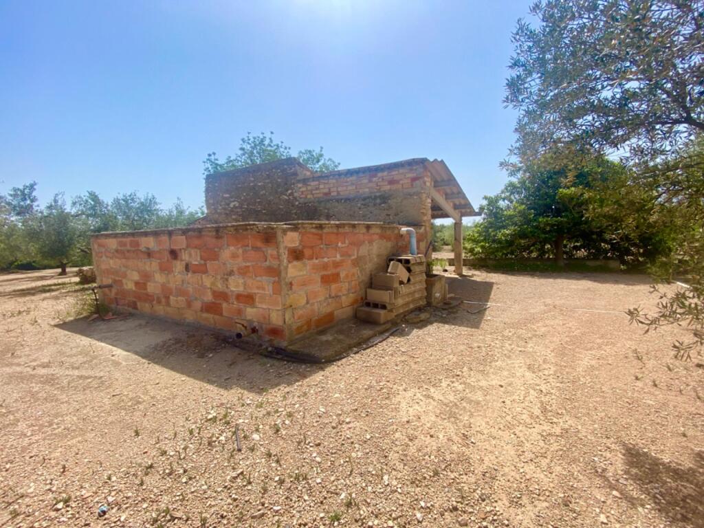 Imagen 4 de Casa de piedra de 60 m2 con balsa en terreno de casi 3 ha