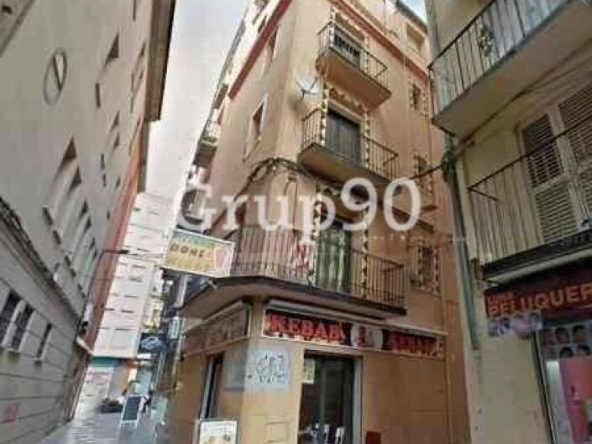 Imagen 1 de Oportunidad única con alta rentabilidad – Edificio plurifamiliar con local comercial en venta en el