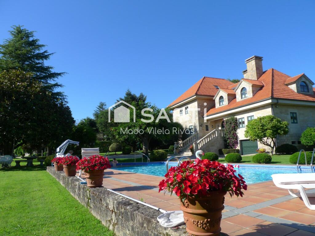 Imagen 2 de SAFTI vende casa de campo exclusiva de piedra con calidades premium en Teo. Elegancia