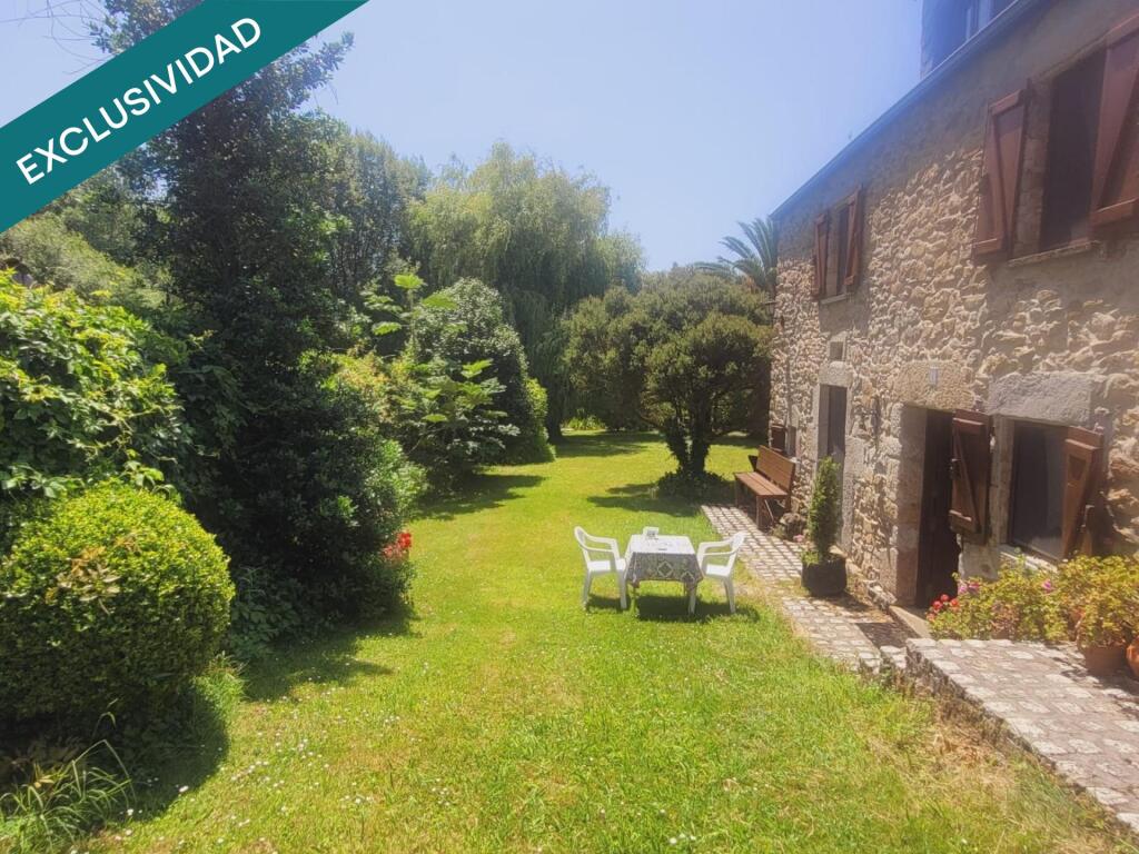 Imagen 2 de CASA DE PIDRA CON JARDIN