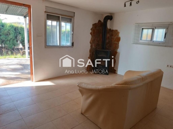 Imagen 3 de Pequeña casa con terreno rústico y acequia de riego