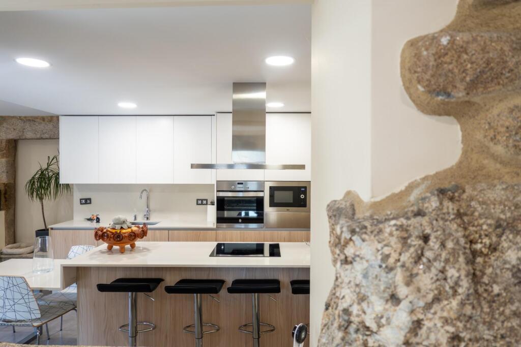 Imagen 3 de Casa de piedra reformada con jardín frente al puente romano de Cernadela (Mondariz)