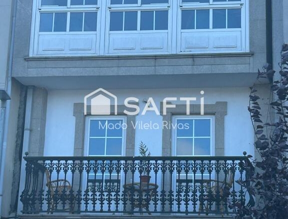 Imagen 4 de Venta de edificio en el centro de Melide de 3 niveles y 7 pisos los cuales incluido el bajo comercial están alquilados.