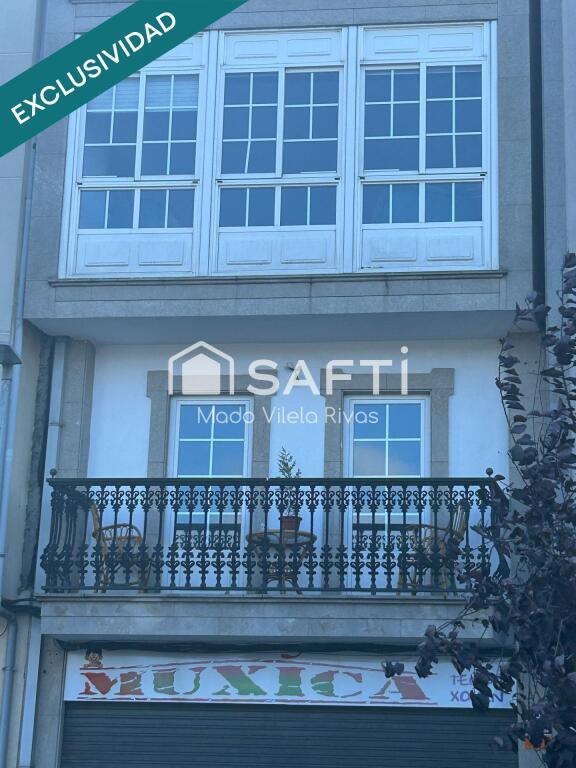 Imagen 4 de Venta de edificio en el centro de Melide de 3 niveles y 7 pisos los cuales incluido el bajo comercial están alquilados.