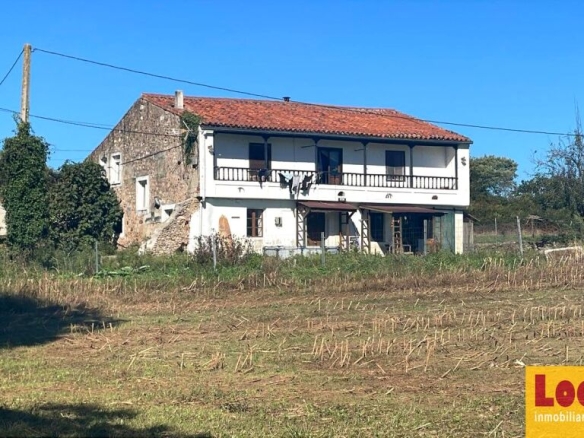 Imagen 1 de Amplios terrenos con vivienda