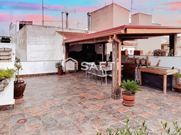 Terraza con barbacoa... Y sin comisión