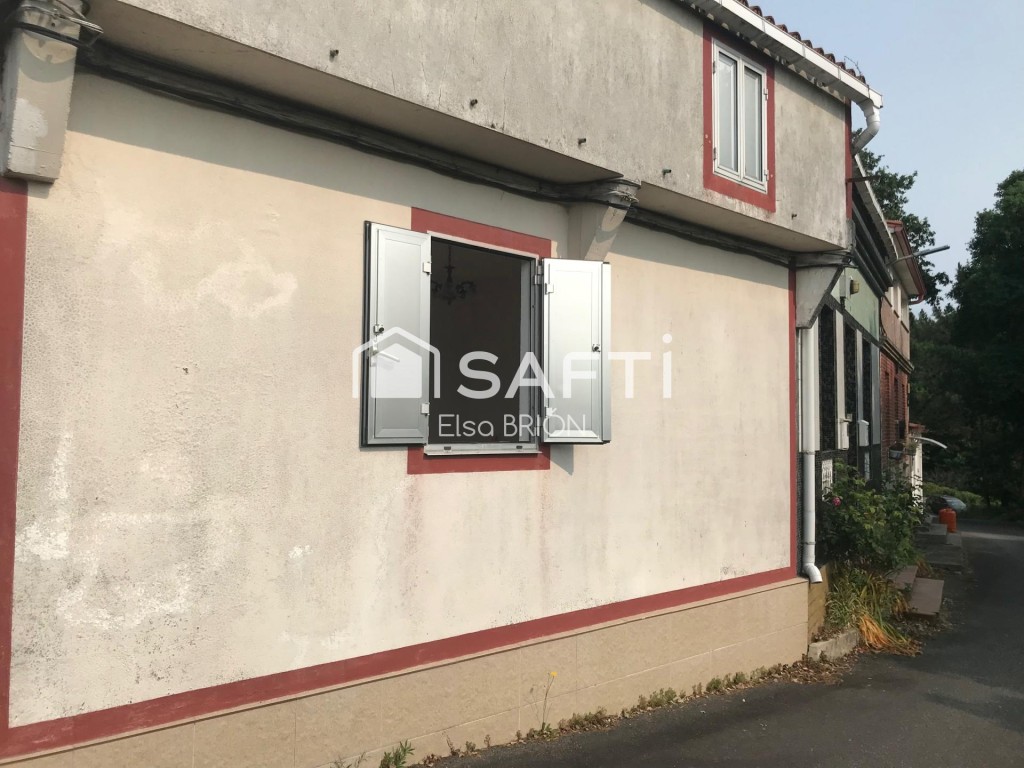 Imagen 3 de Casa adosada con huerta.