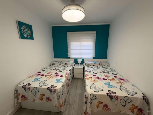 de 60m2 con 2 dormitorios y 1 baño