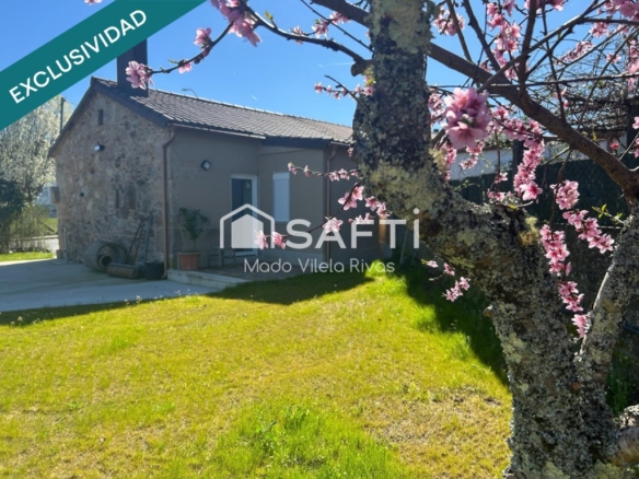 Imagen 1 de Encantadora casa tipo cottage reformada con terreno y terraza.