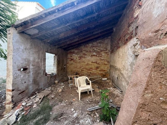 de 500m2 con 5 dormitorios y 2 baños