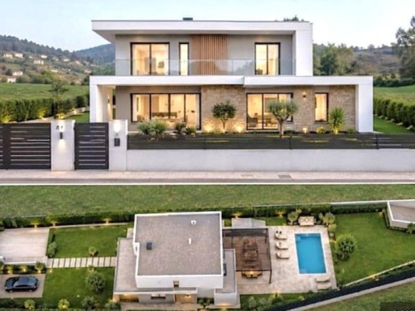 Imagen 1 de La oportunidad de construir tu exclusiva vivienda sin esperas Parcela urbana con licencia y proyecto de vivienda de diseño en la zona de Bugalido (Ames)