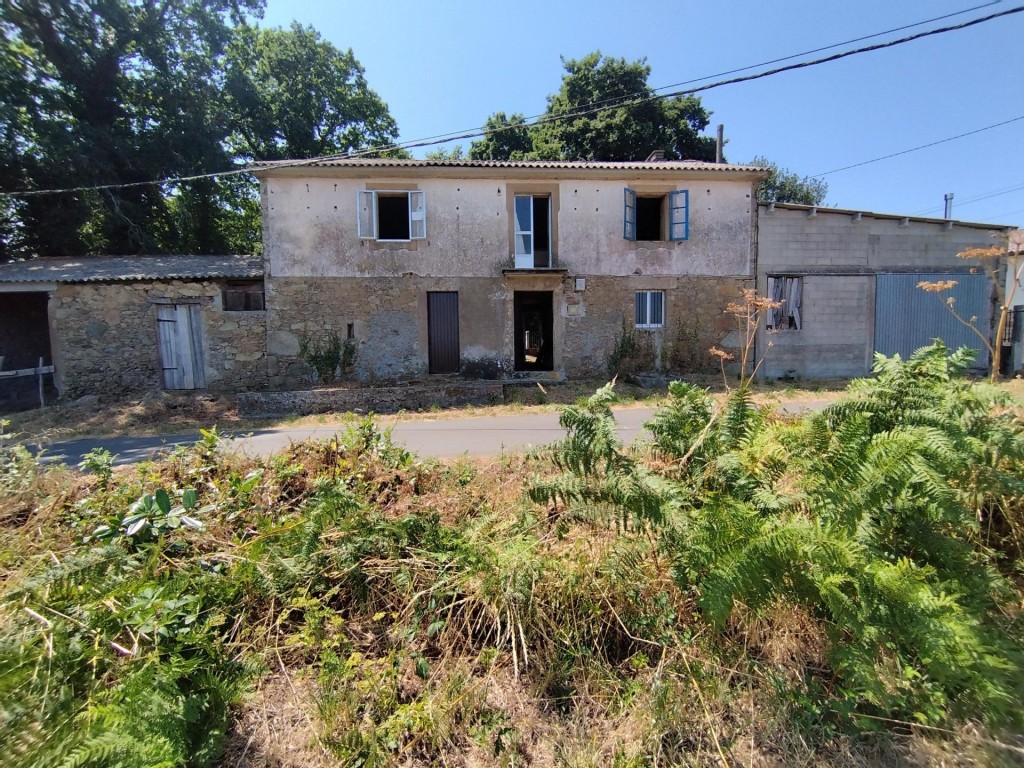 Imagen 1 de casa de piedra en venta