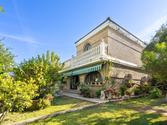 Imagen 1 de Chalet y parcela segregable en Palomares del Río